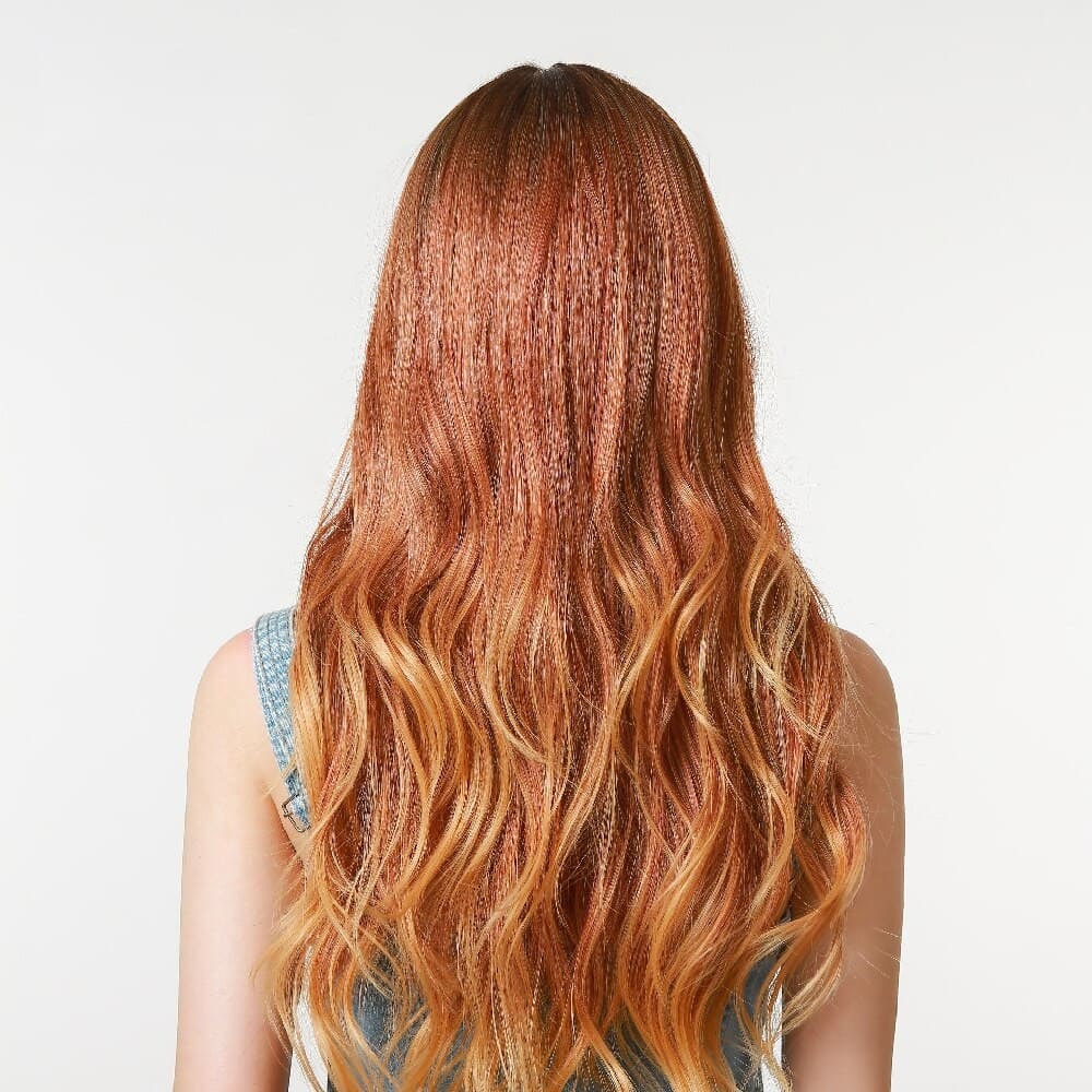 Perruque synthétique rousse frange